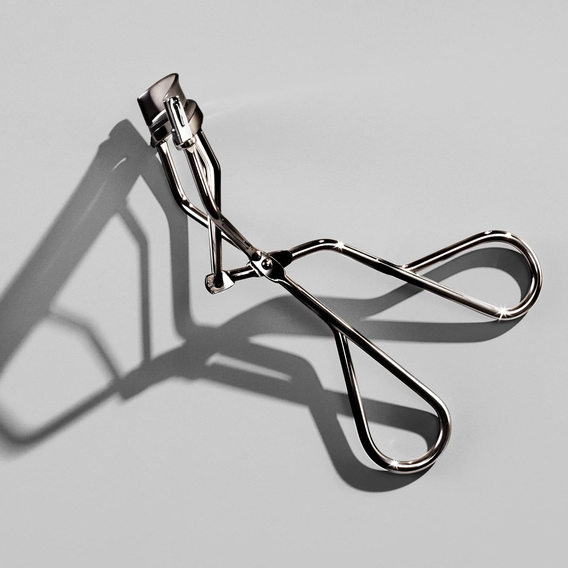 Shiseido Eyelash Curler - Crimps & Curls Lashes for Perfect, Eye-Framing Fringe - Gentle & Safe - Includes Replacement Pad - Maple Wellness Supplements